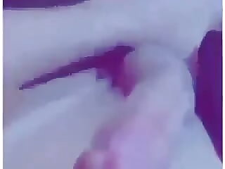 Masturbating